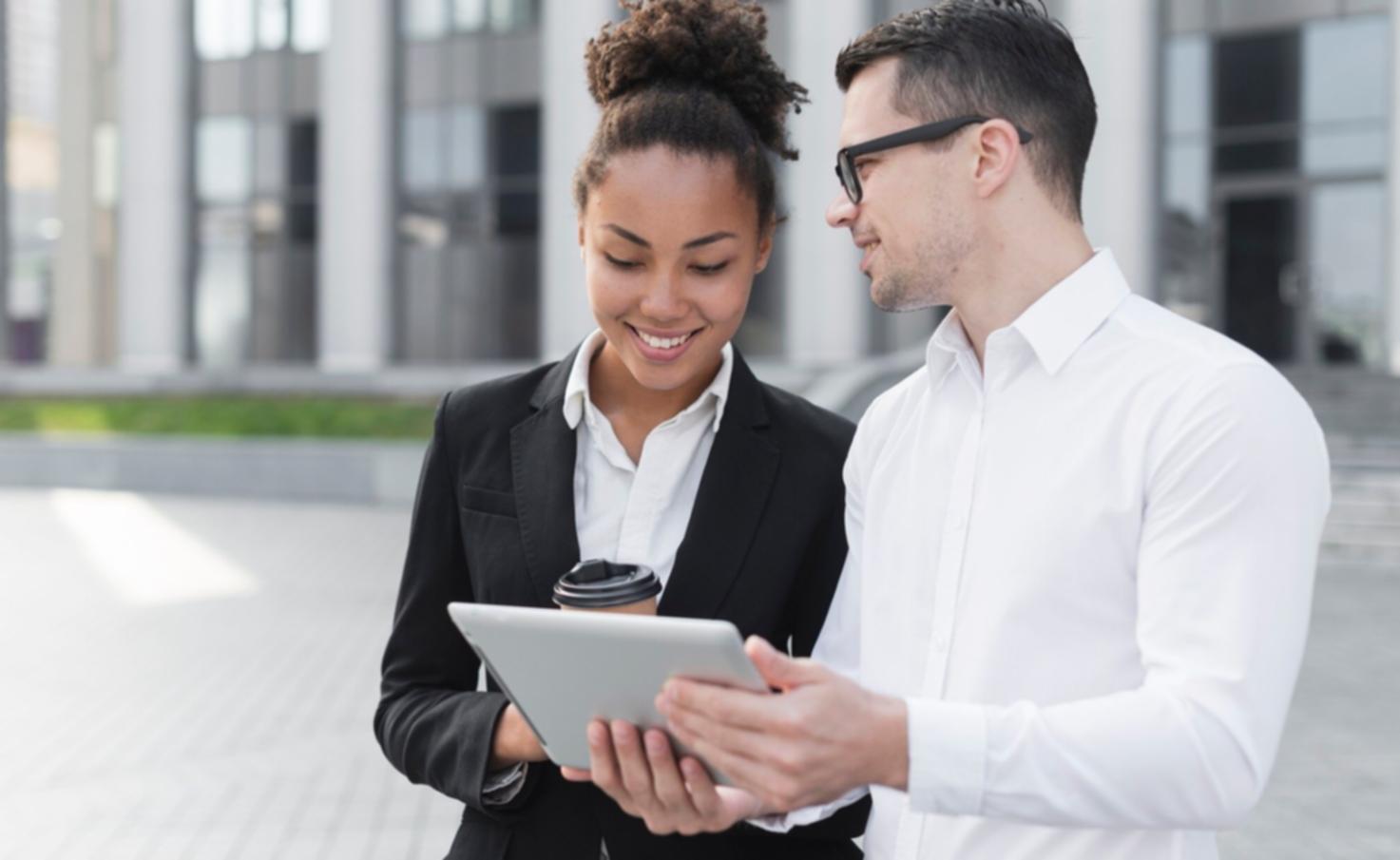 Security professionals collaborating on threat analysis in modern training facility