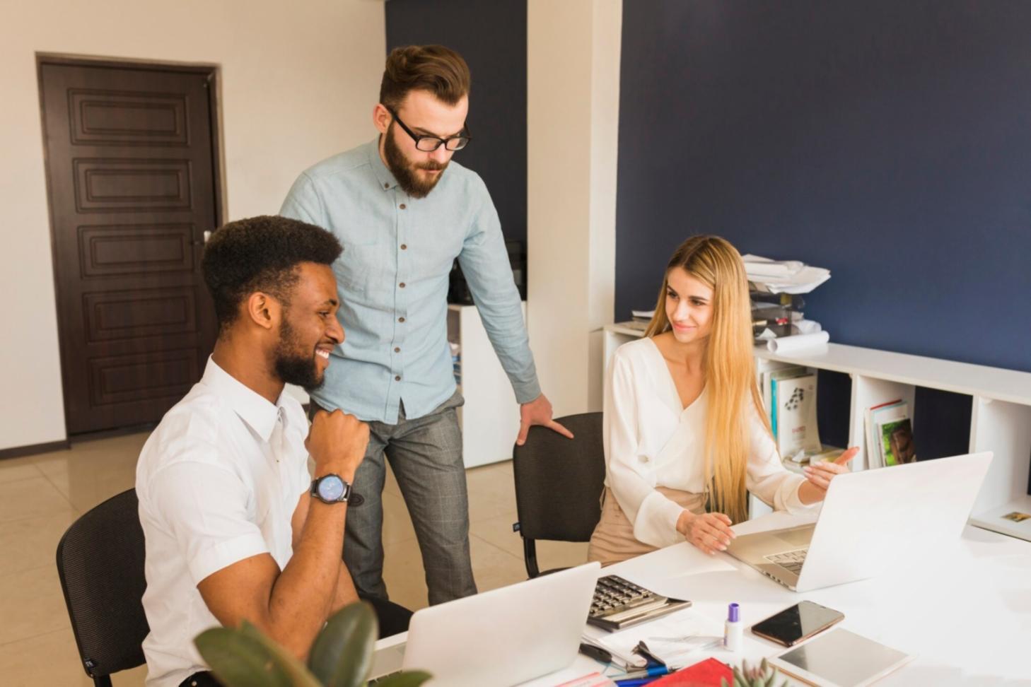Interactive banking security training session with participants reviewing real case studies